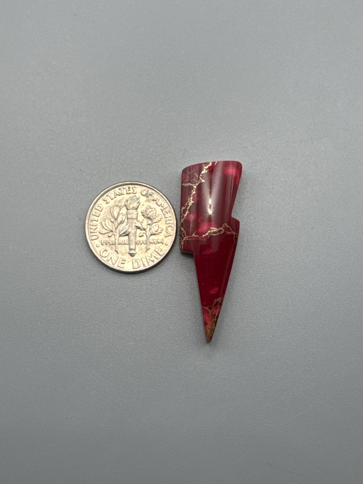 Red/white Cabochon Show lightning bolt (reconstructed)
