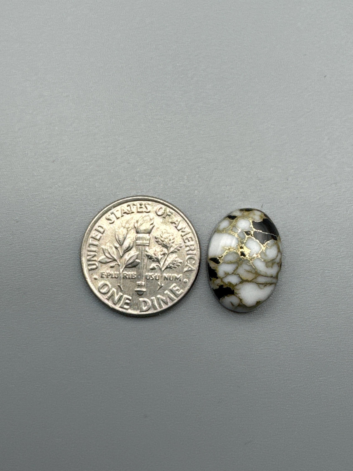White Calcite with obsidian moon Cabochon