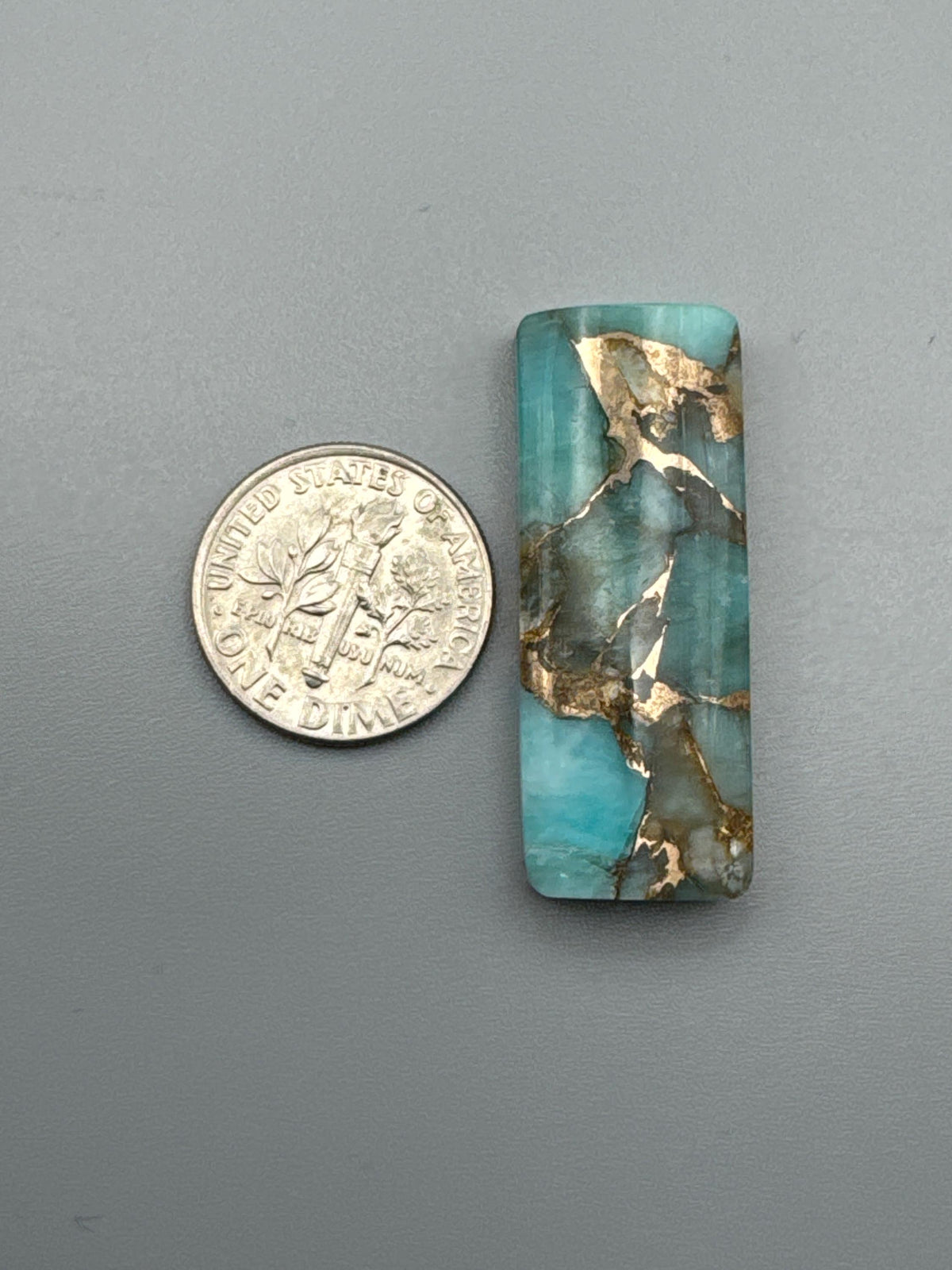 Amazonite With Bronze Cabochon