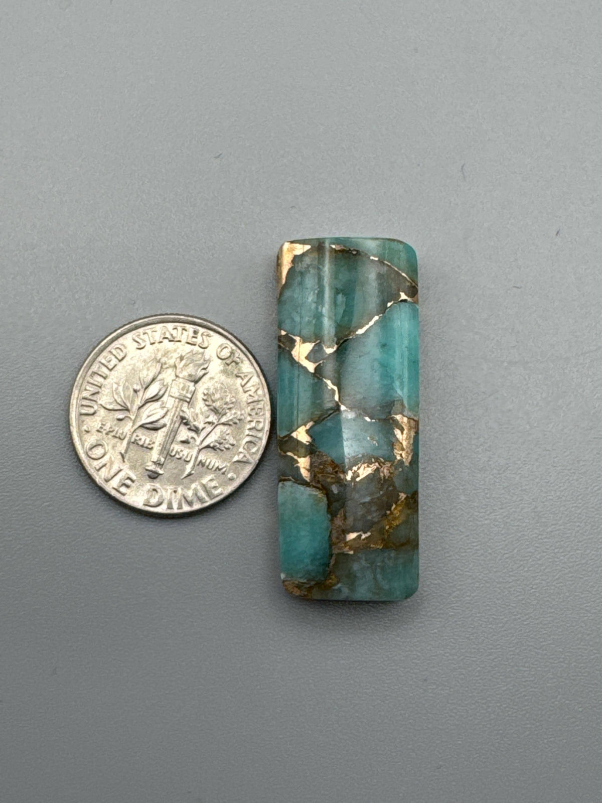 Amazonite With Bronze Cabochon