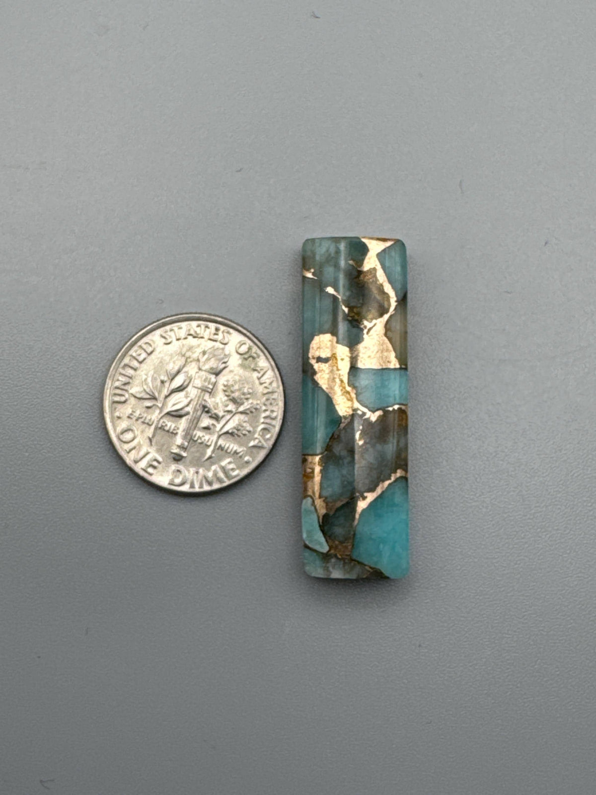 Amazonite With Bronze Cabochon
