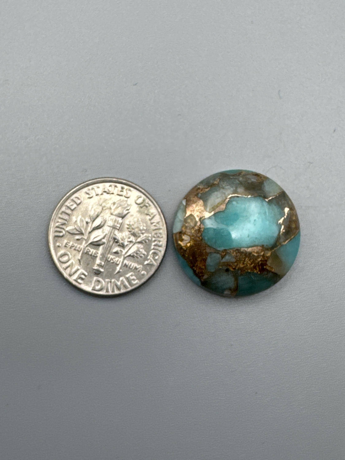 Amazonite With Bronze Cabochon