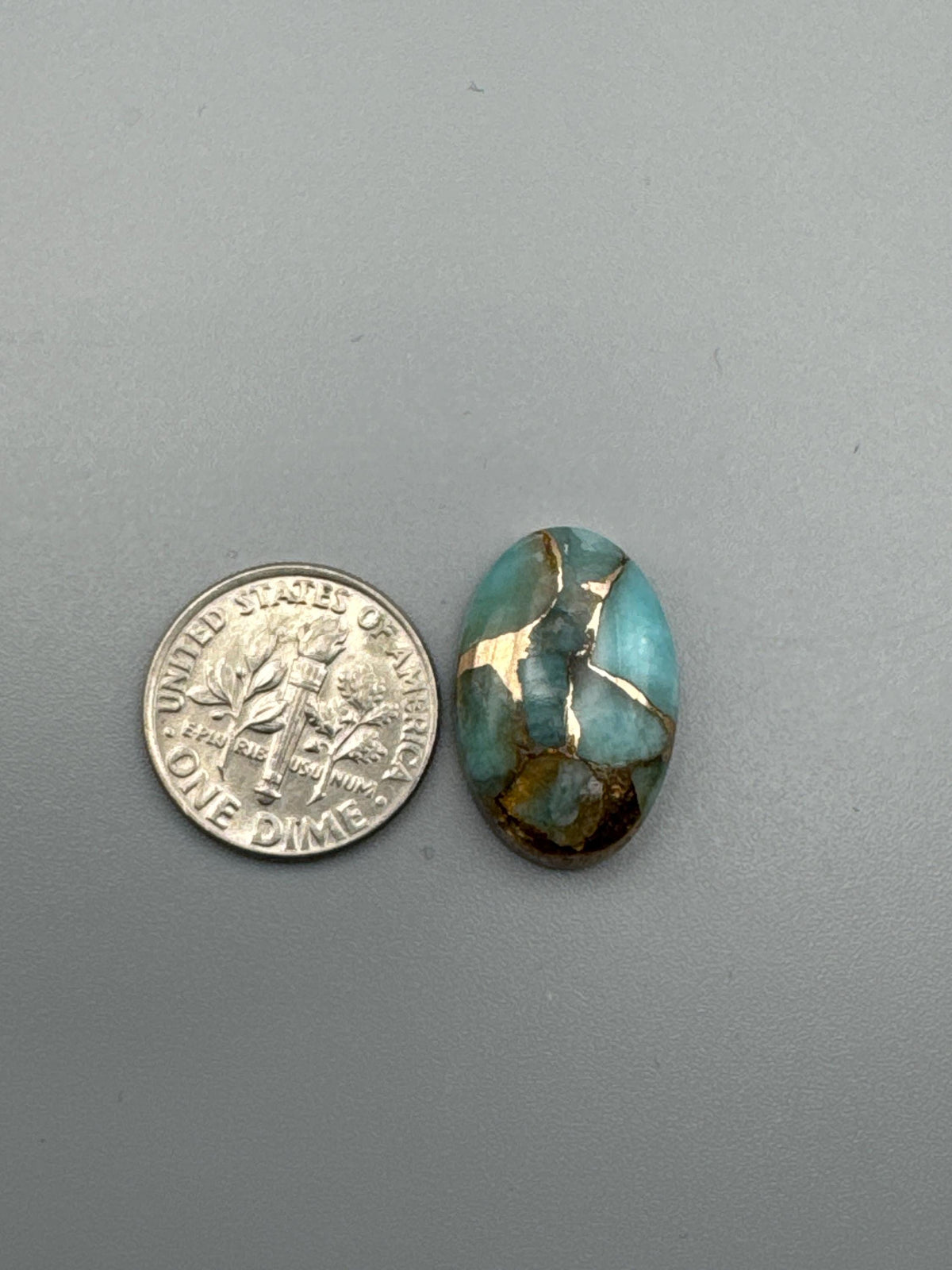 Amazonite With Bronze Cabochon