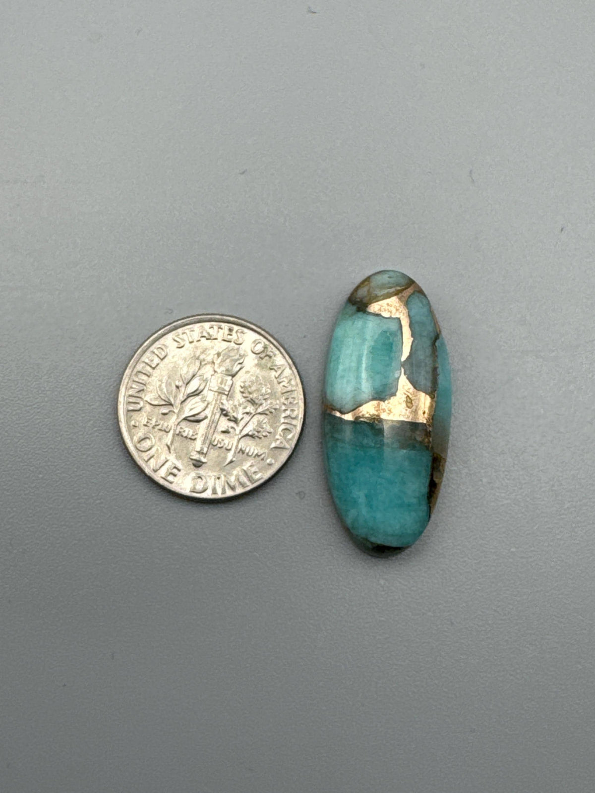 Amazonite With Bronze Cabochon