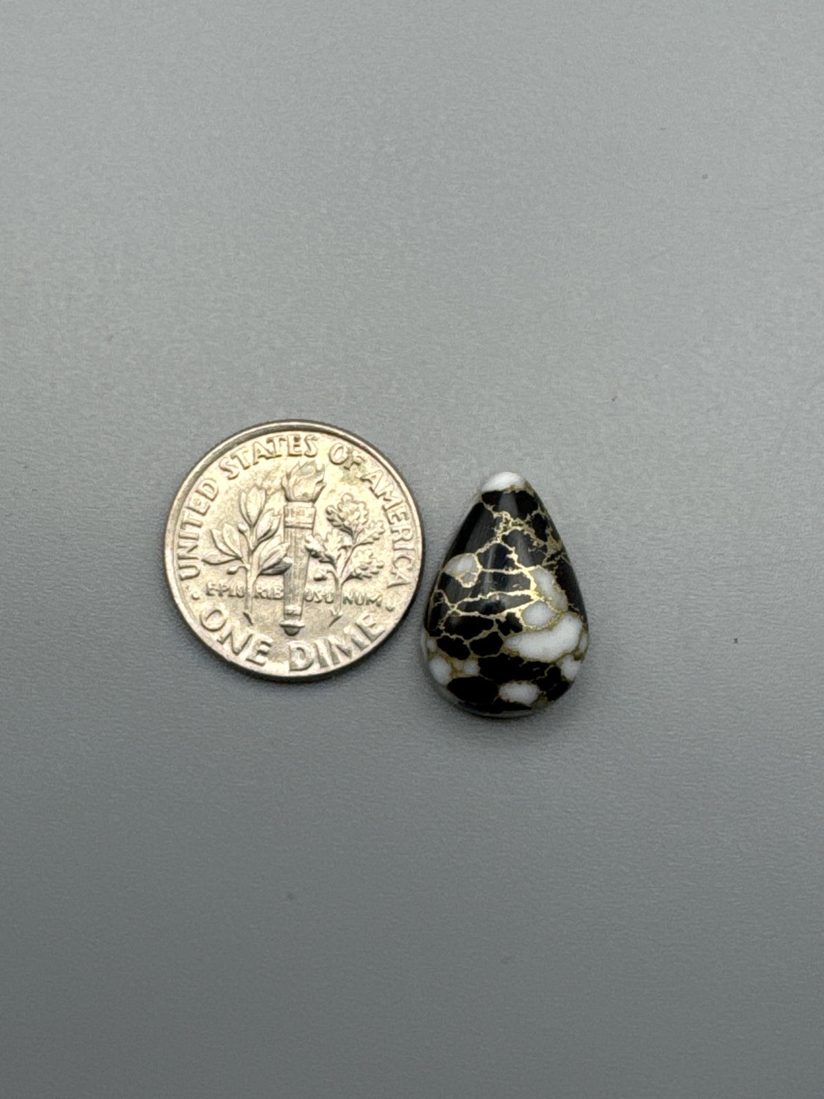 White Calcite with obsidian moon Cabochon