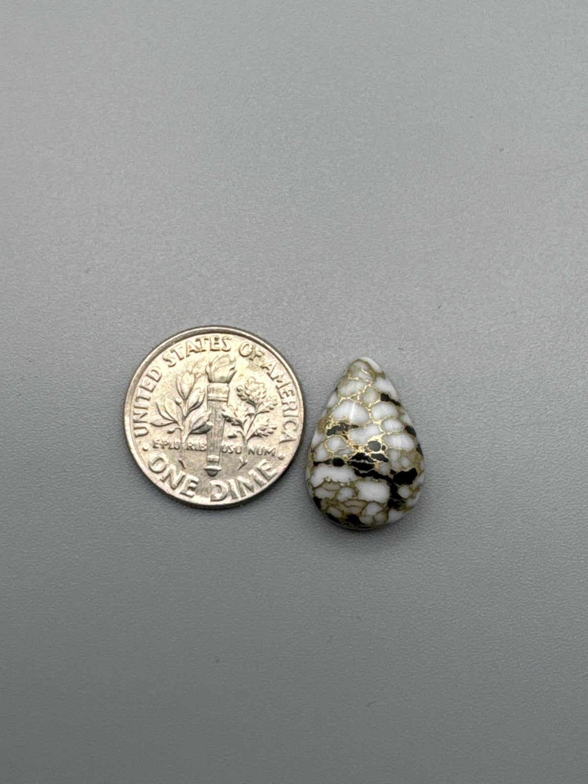 White Calcite with obsidian moon Cabochon