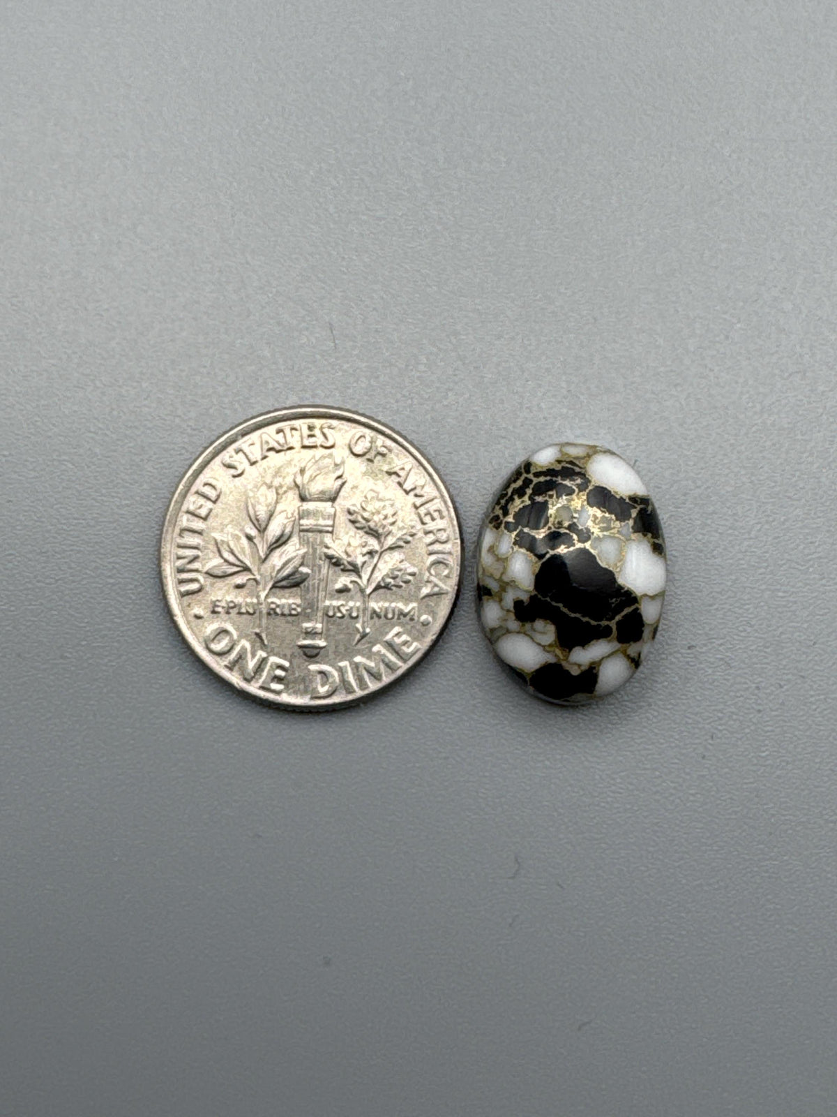 White Calcite with obsidian moon Cabochon