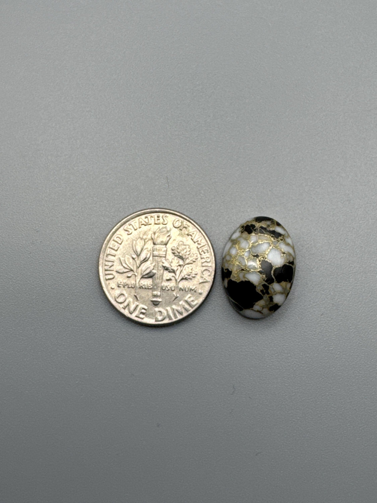 White Calcite with obsidian moon Cabochon