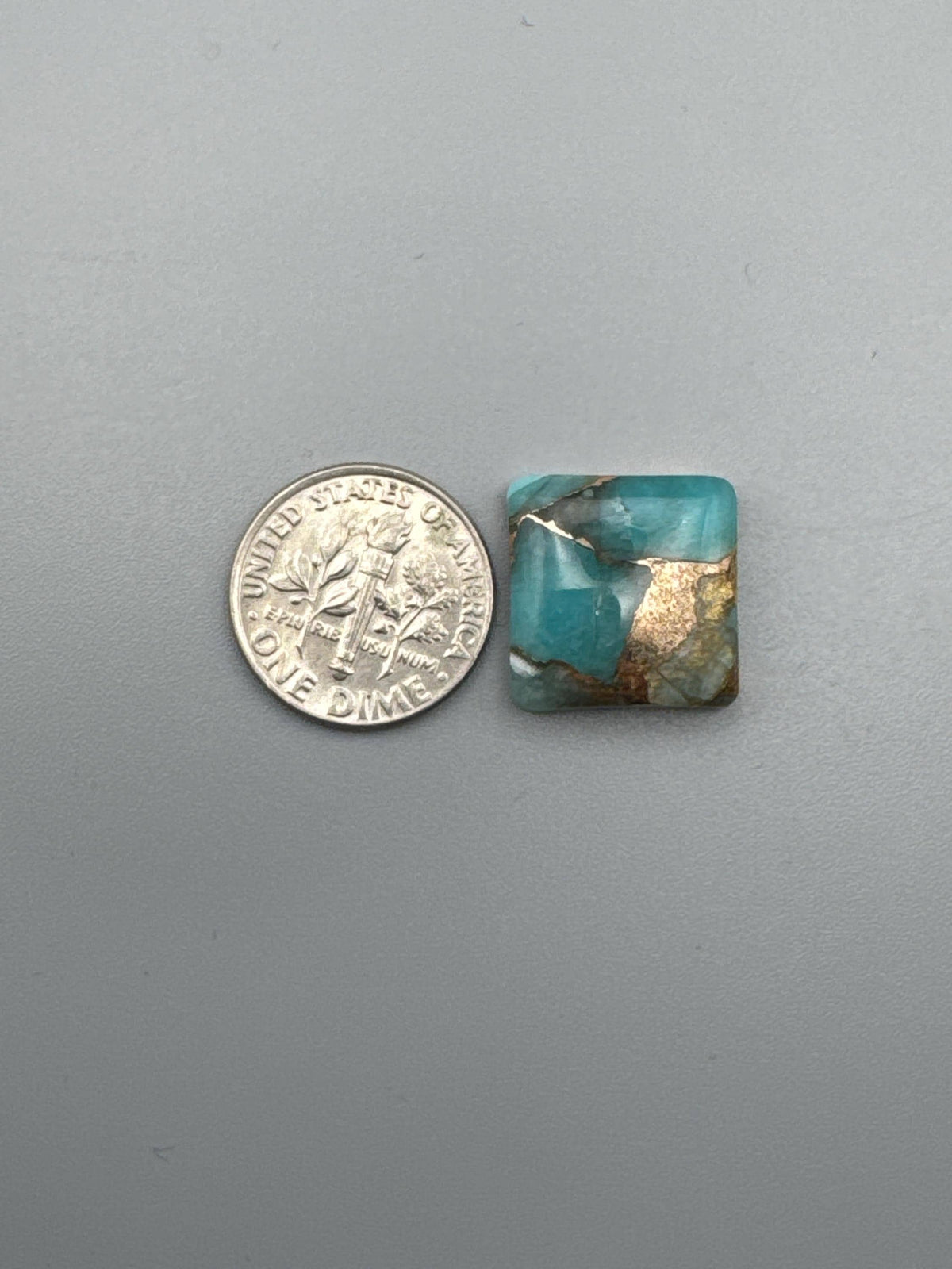 Amazonite With Bronze Cabochon