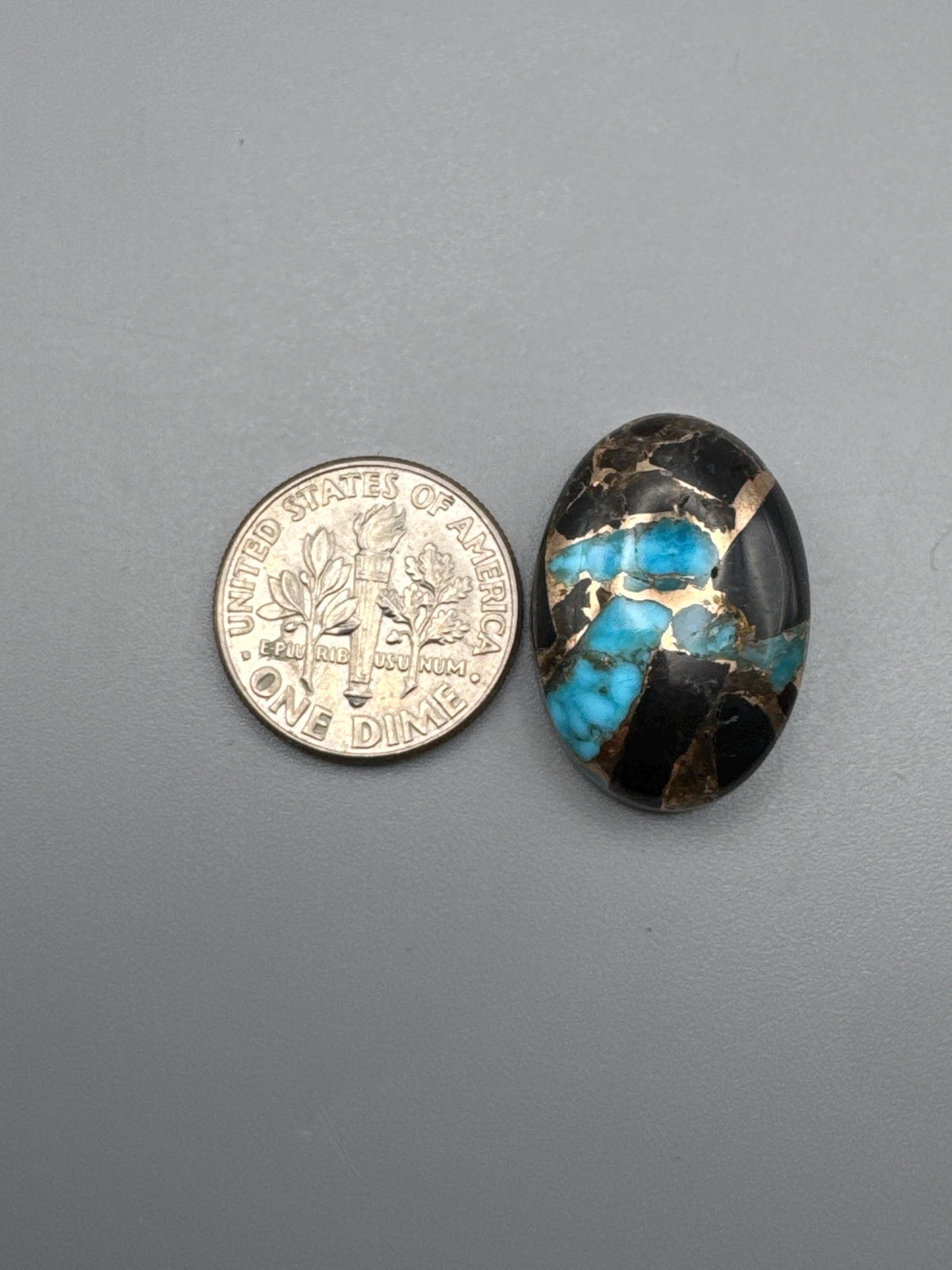 Kingman Turquoise with obsidian cabochon