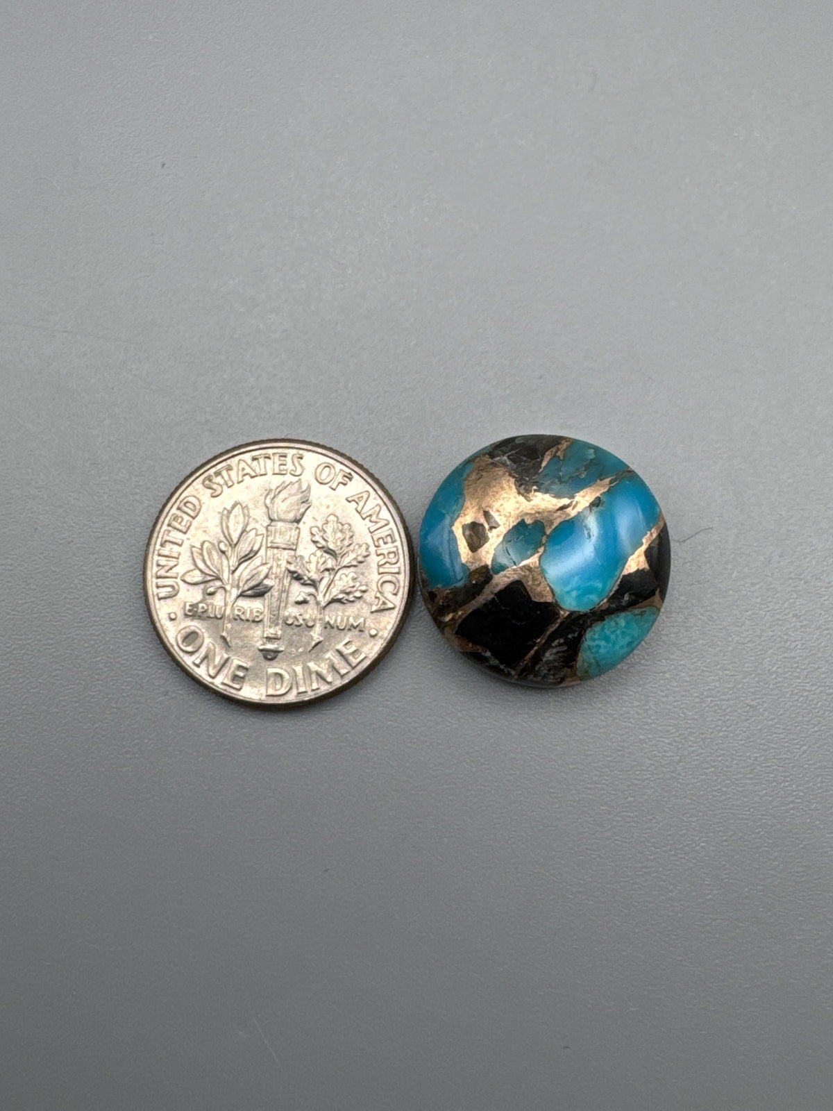 Kingman Turquoise with obsidian cabochon